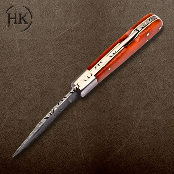 Handcrafted Damascus Steel Folding Knife with Vibrant Orange Handle - Image 2